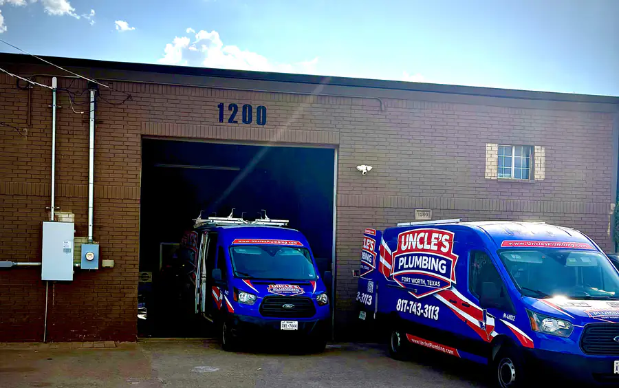 Uncle's Plumbing shop at 1200 E Kennedale Parkway in Kennedale, Texas, with two branded service vans